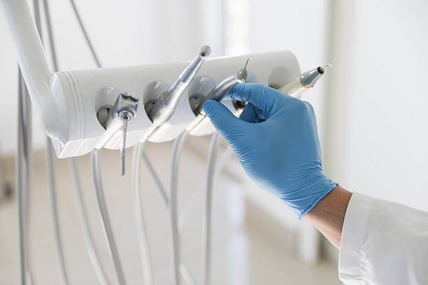 Professional Emergency Dentist technician working in Chelsea, MA